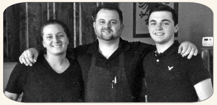Millie, Nick, and son at Nick's Italian Restaurant