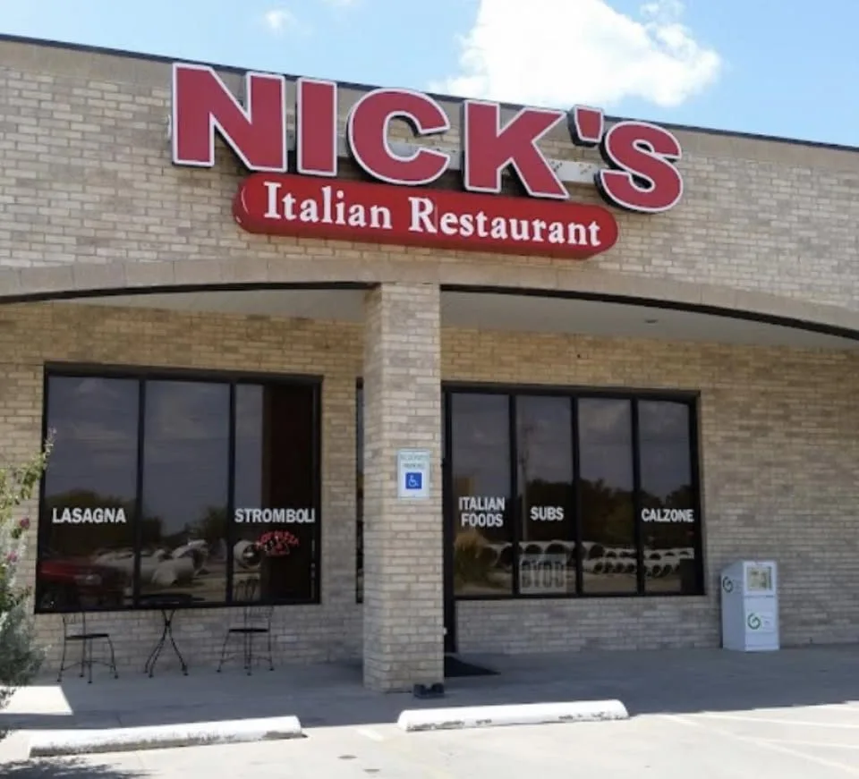 The storefront of Nick's Italian Restaurant in Pilot Point, Texas